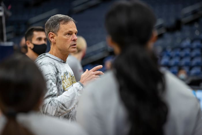 Husker Volleyball Coach John Cook works to understand his players, a generation that grew up with iPhones. He also fights to make himself care more about the journey of a season than its final result.